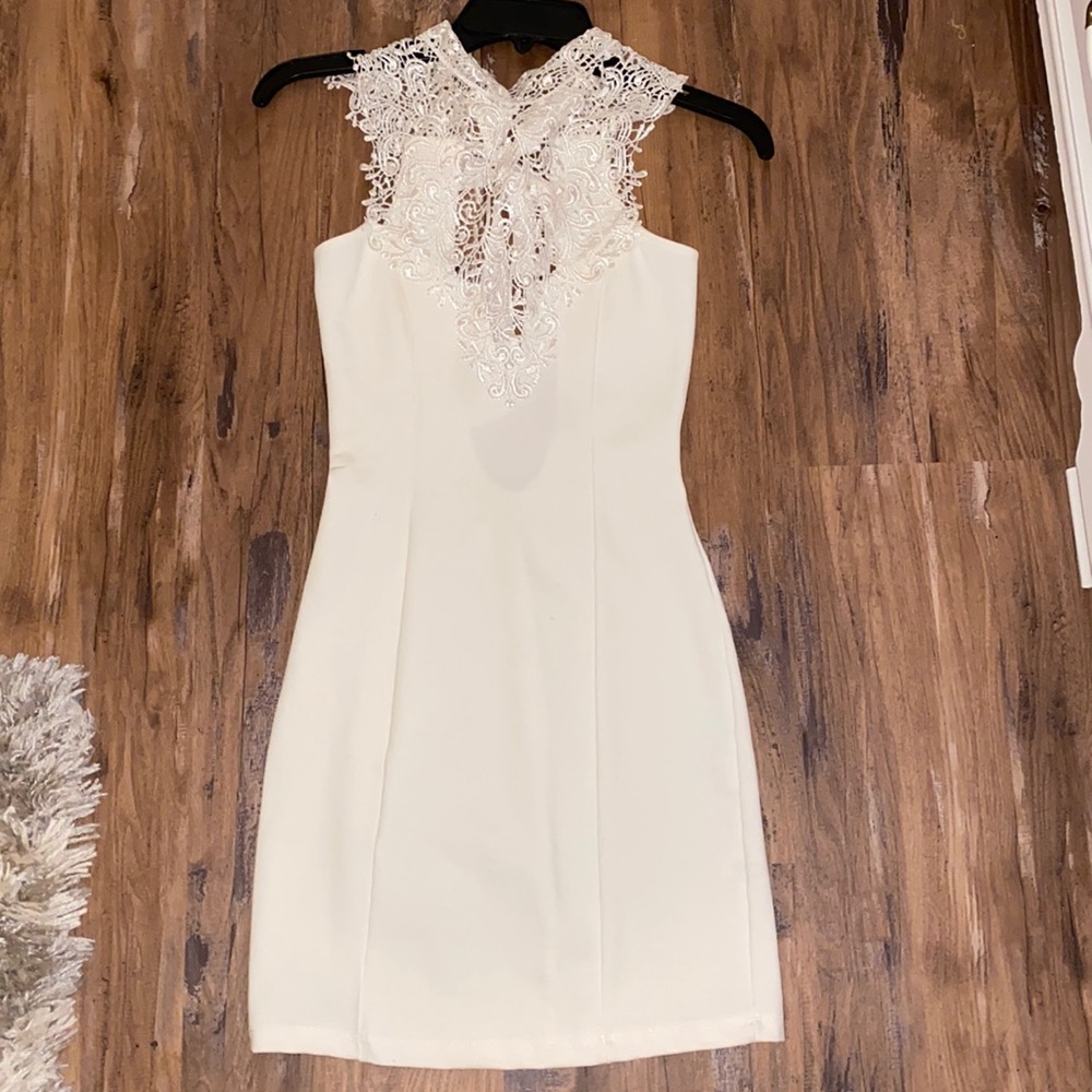White dress with lace neckline design